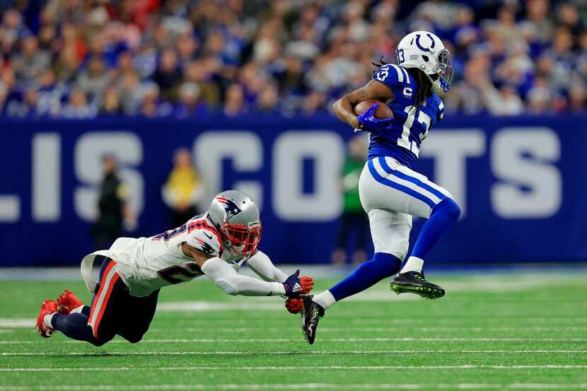Indianapolis Colts wide receiver T.Y. Hilton (13) runs past New England Patriots cornerback...