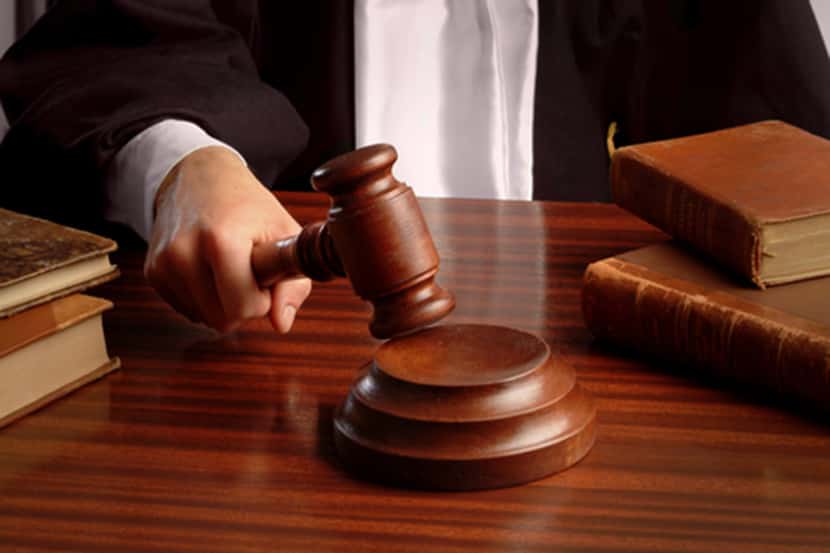 Judge hand with gavel (Dreamstime/TNS)