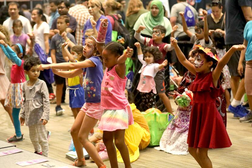 Children dance during a demonstration by the Dynasty Dance Academy during the Families First...