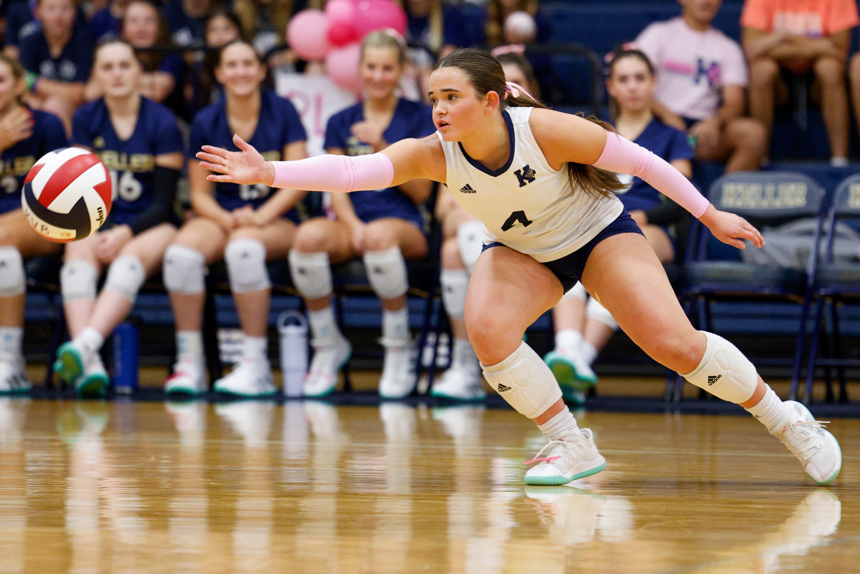 Keller's Lauren Scheiden (4) watches as the ball falls outside of her reach during a high...