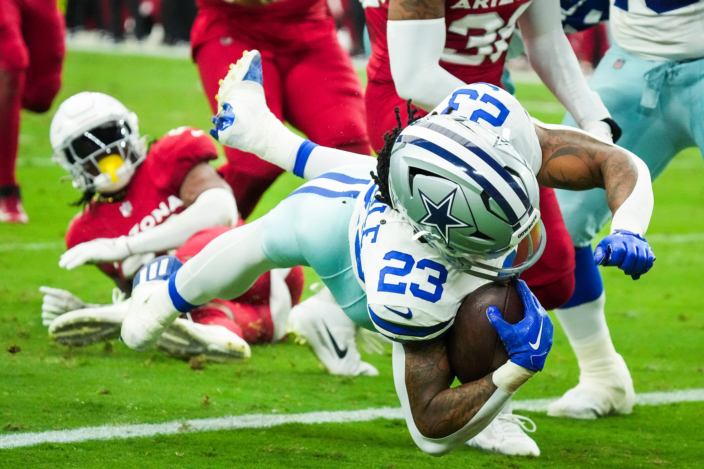 Dallas Cowboys running back Rico Dowdle (23) dives into the end zone for a touchdown  during...