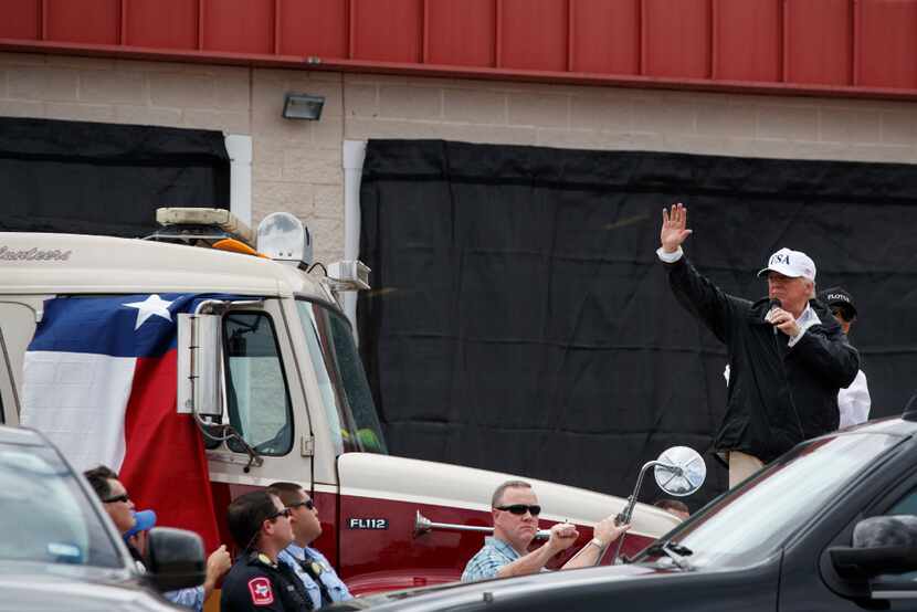 President Donald Trump waves to supporters outside Firehouse 5 in Corpus Christi on Tuesday,...