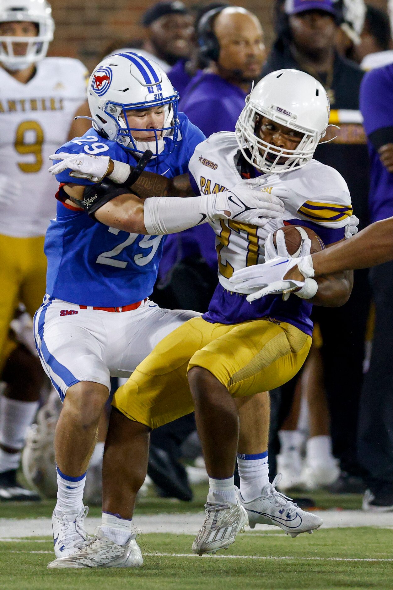 SMU linebacker Brandon Miyazono (29) tackles Prairie View A&M running back Jamarious Brooks...