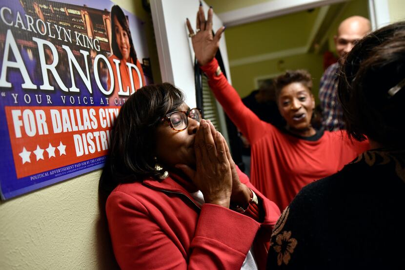 Candidate Carolyn King Arnold reacts as she's announced the winner of the Dallas City...