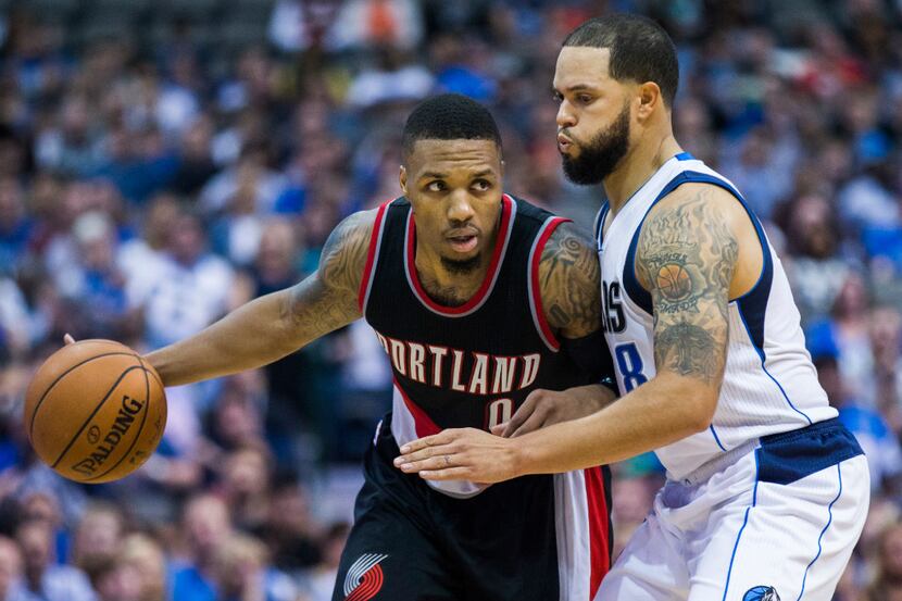 Dallas Mavericks guard Deron Williams (8) defends against Portland Trail Blazers guard...