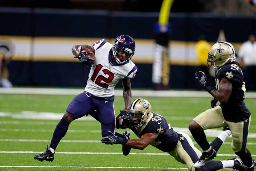 Houston Texans wide receiver Bruce Ellington (12) carries against New Orleans Saints safety...