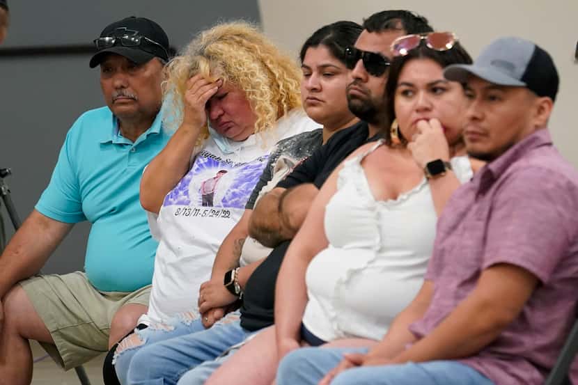 Family of shooting victims listen to the Texas House investigative committee release its...