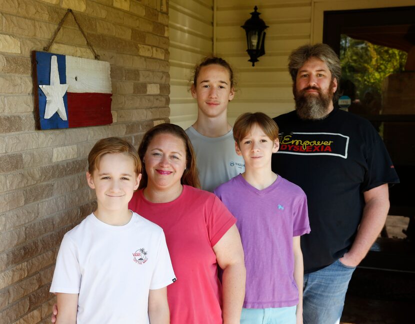 (from l to r) Ashton, 11; Amy; Asher, 15; Aden, 14; and Stephen Yearout pose for a portrait...