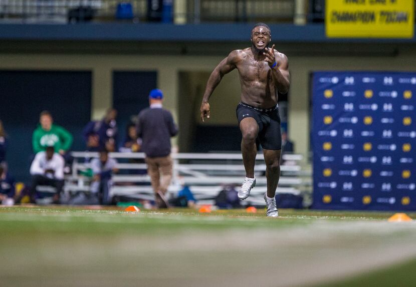Running back Dexter Williams runs a drill during Notre Dame Pro Day on Wednesday, March 20,...