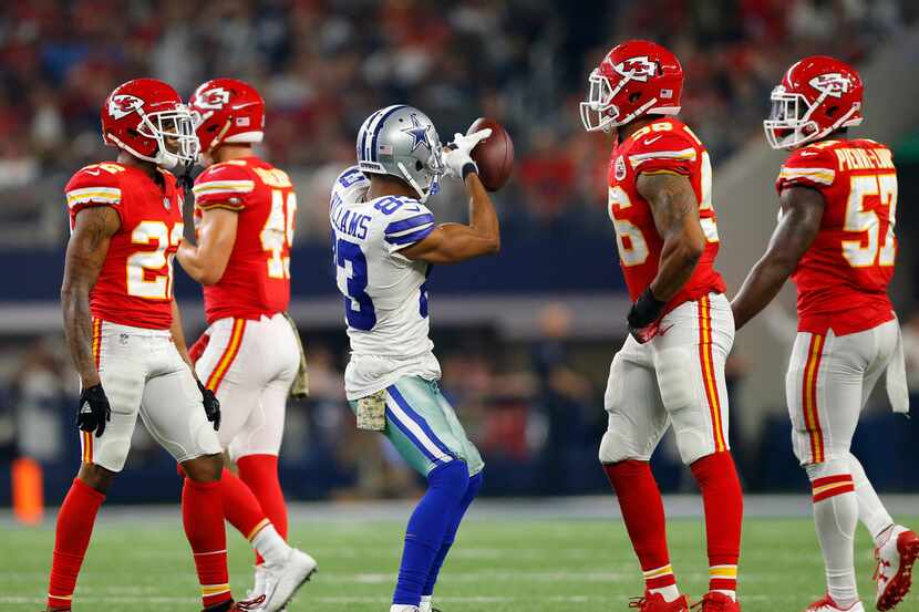 Dallas Cowboys wide receiver Terrance Williams (83) signals first down after he made a catch...