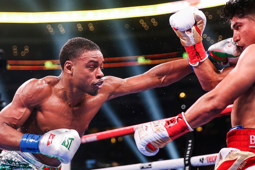 Errol Spence Jr. lands a punch on Mikey Garcia during a IBF World Welterweight Championship...