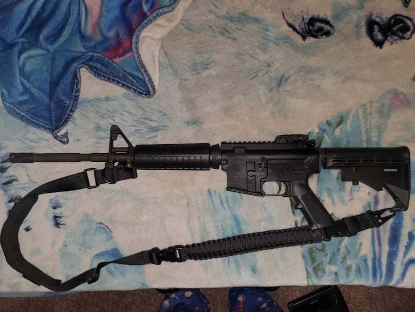 Image of a rifle posted on social media by the person accused of carrying out the Allen mall...