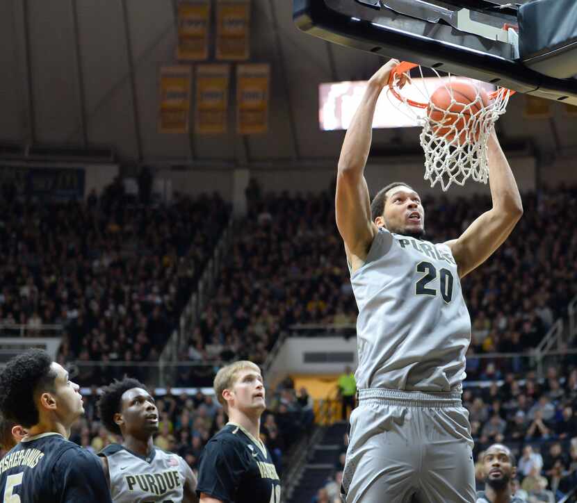 A.J. Hammons #20 of the Purdue Boilermakers slam dunks the basketball during the game...