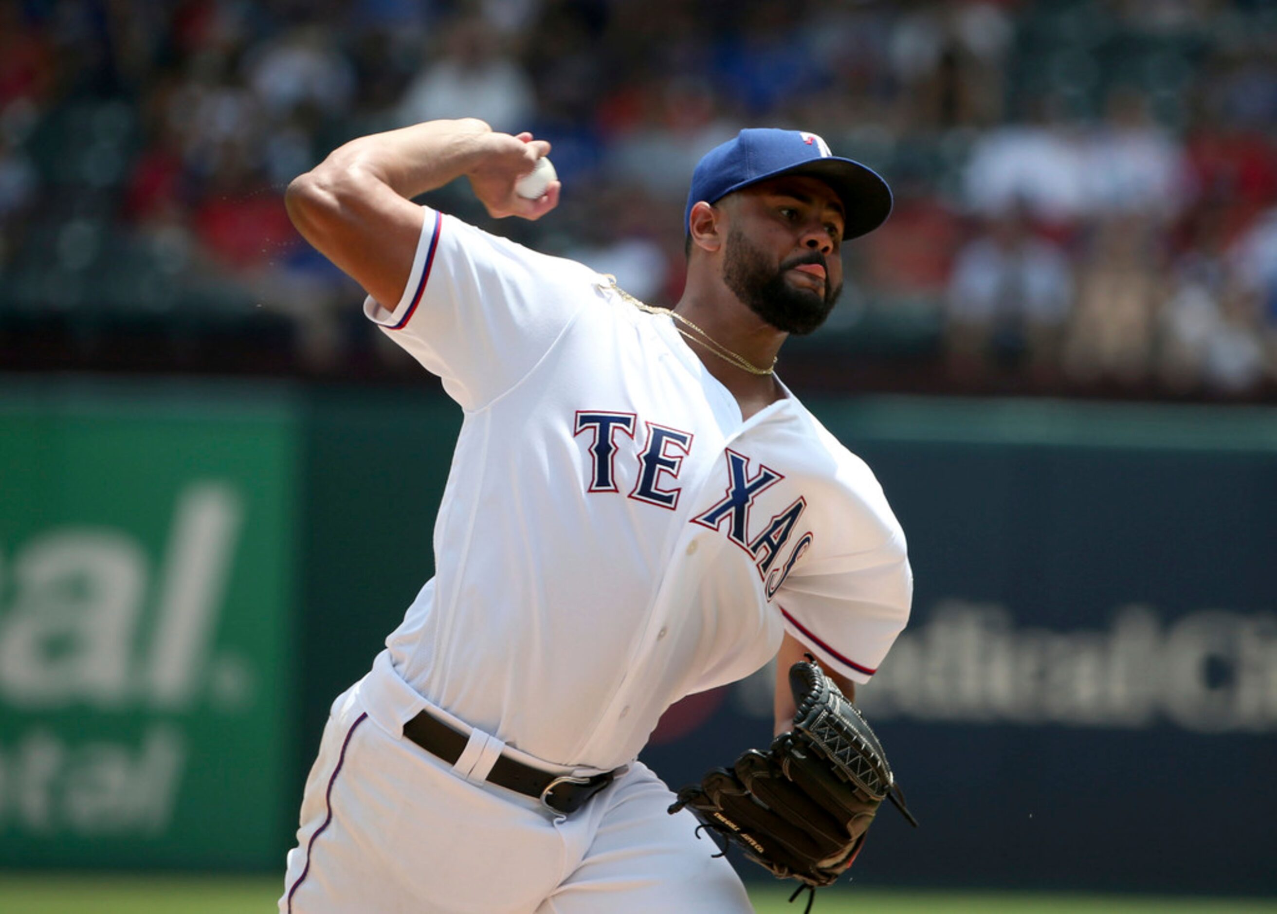 Texas Rangers starting pitcher Pedro Payano (51) pitches against the Detroit Tigers during...