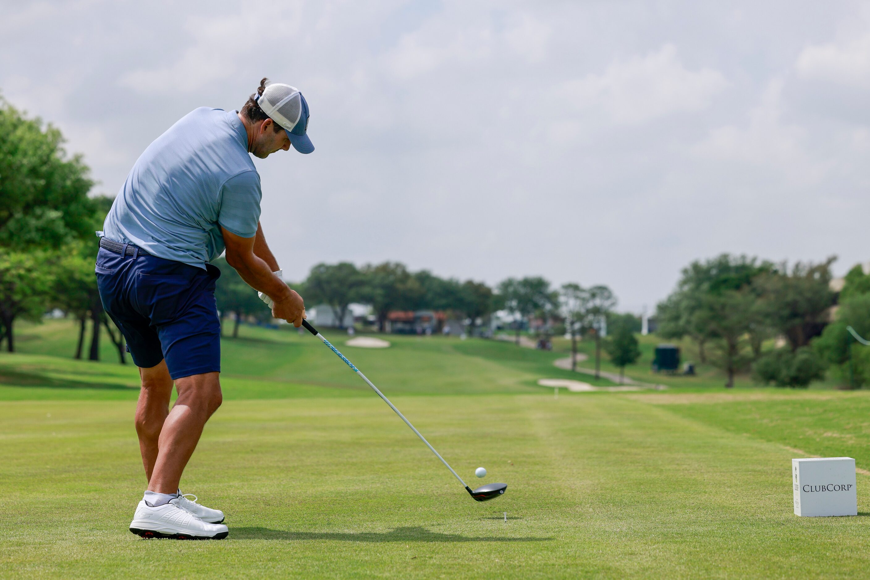 Former Dallas Cowboys quarterback Tony Romo hits off the ninth tee box during the ClubCorp...