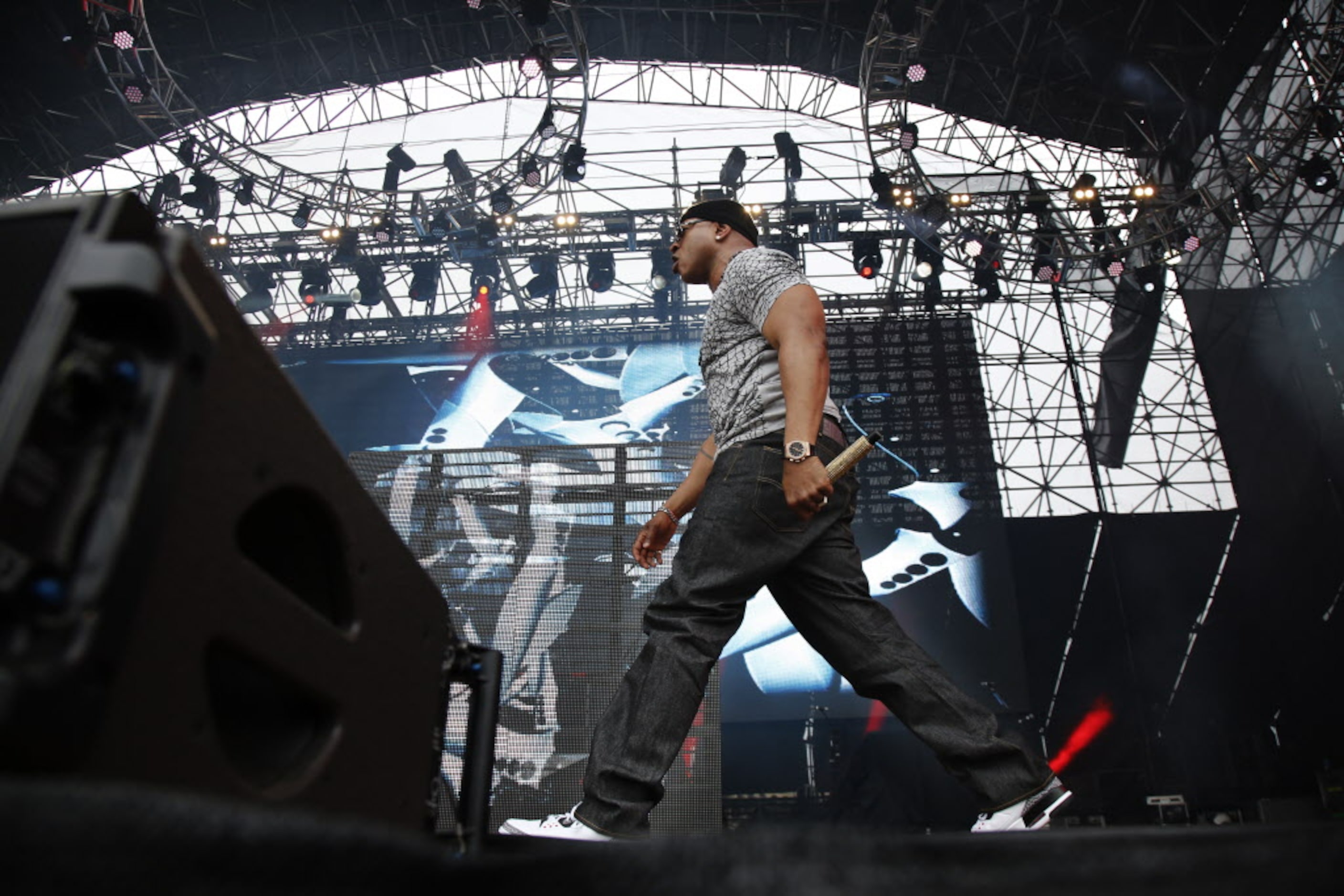 LL Cool J paces the stage as he performs during the March Madness Music Festival at Reunion...