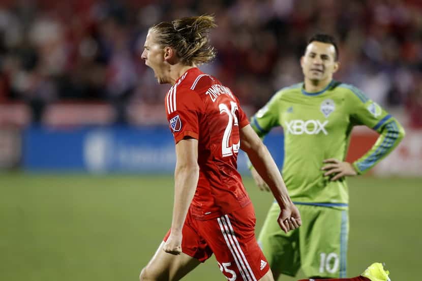 FC Dallas defender Walker Zimmerman (25) reacts to scoring the teams second goal as Seattle...