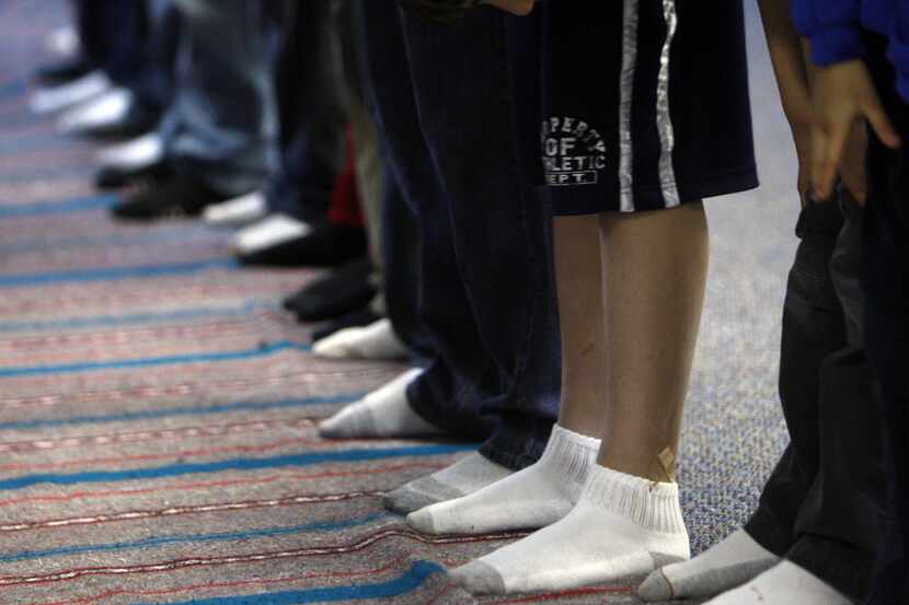 Muslim youths took part in prayer during youth day at the Muslim American Society Youth...