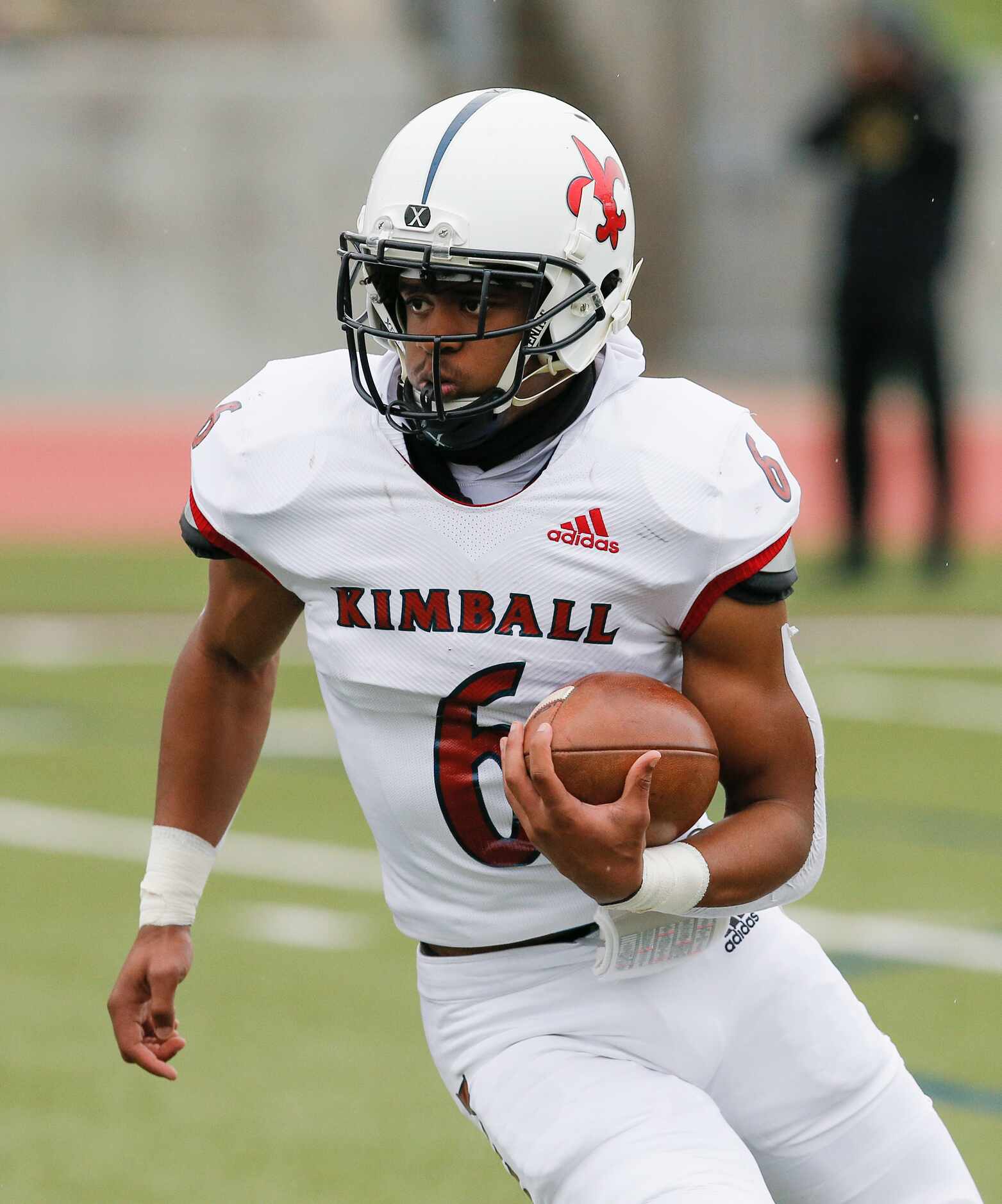 Kimball senior running back Brandon Epton Jr. (6) carries the ball during the first half of...