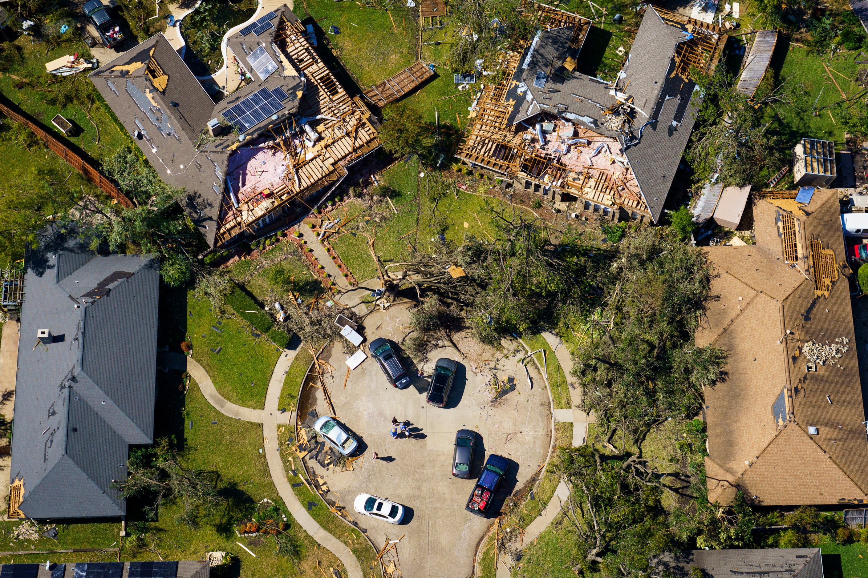 Damaged homes in a cul-de-sac on Stillmeadow Drive in Richardson on Monday, Oct. 21, 2019,...