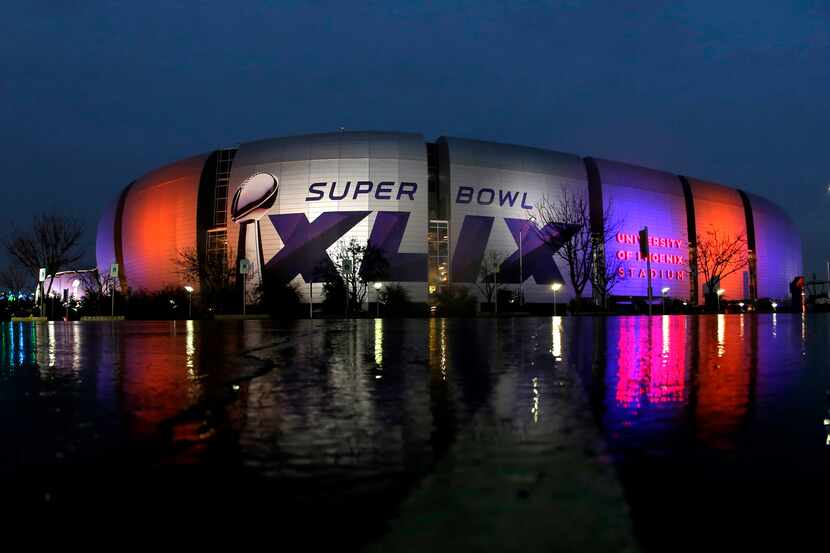 The Super Bowl XLIX is displayed on the University of Phoenix Stadium Thursday, Jan. 29,...