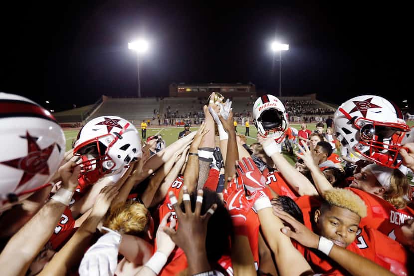 TXHSFB  Coppell celebrates their 37-6 win over Rowlett in the class 6A Division I...