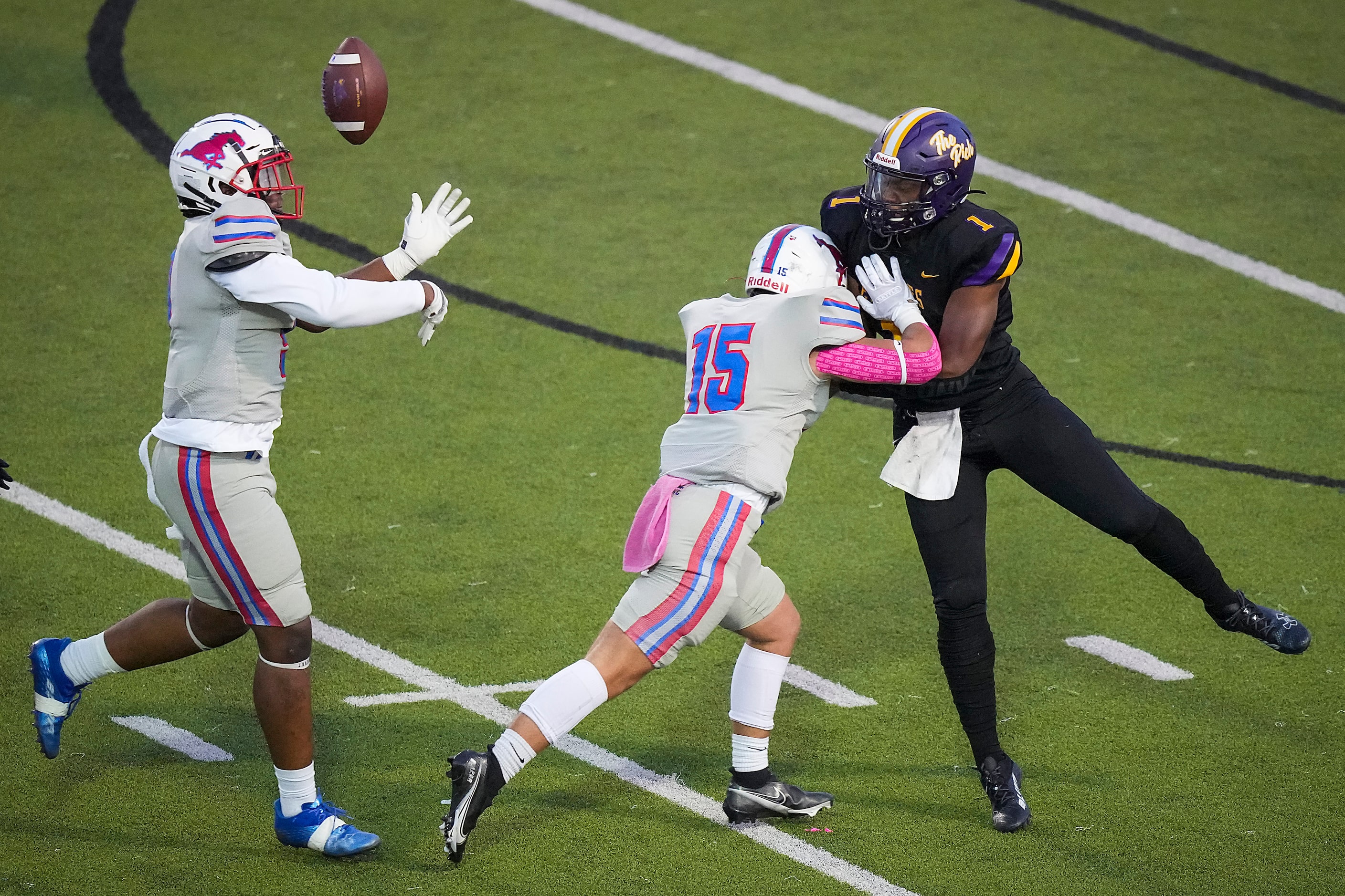 Richardson Pearce defensive lineman Jonathan Agumadu (9) knocks down a pass by Richardson...