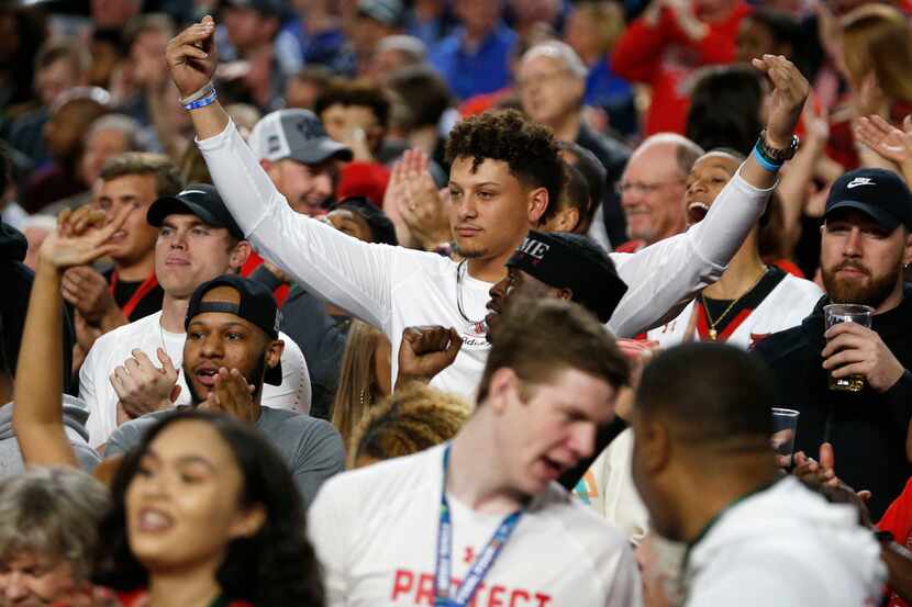 Former Texas Tech Red Raiders football player Patrick Mahomes celebrates after a made basket...