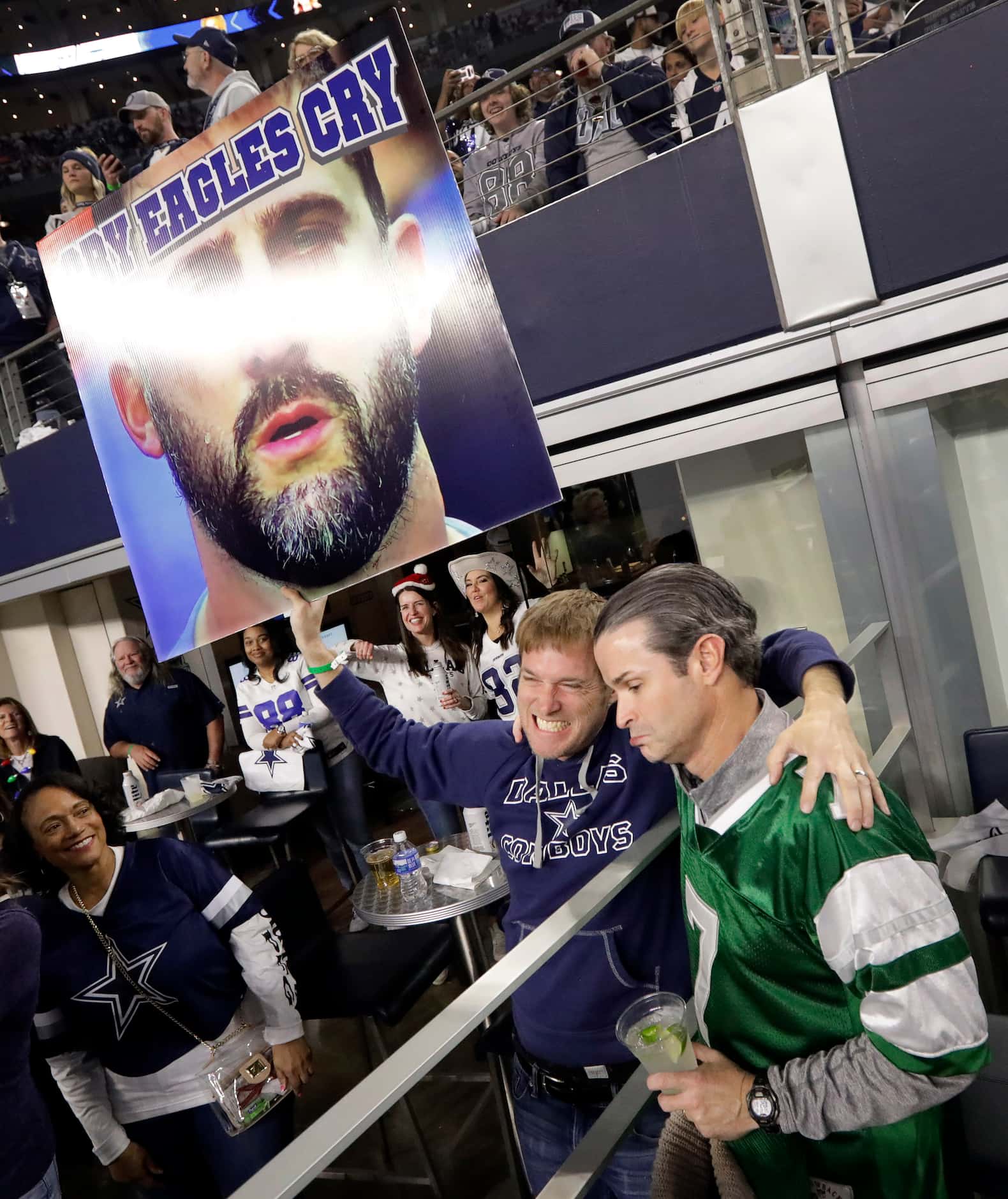 A Dallas Cowboys fan comforted a Philadelphia Eagles fan late in the fourth quarter of the...