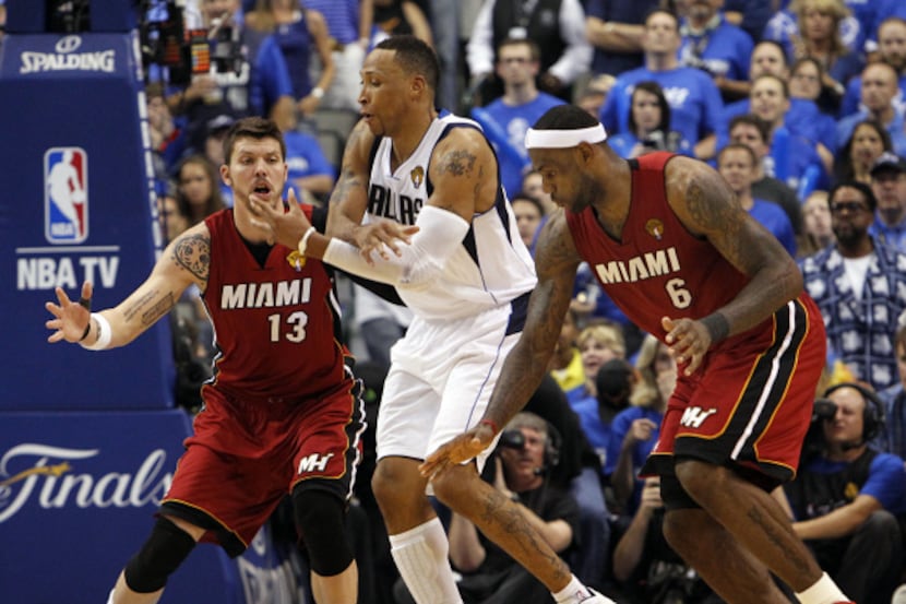 Miami Heat small forward LeBron James (6) steals the ball from Dallas Mavericks small...