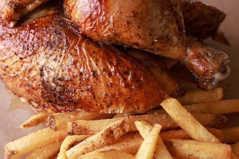 Rotisserie chicken and fries at La Bodega in Dallas, Texas. The restaurant opened July 5, 2022.