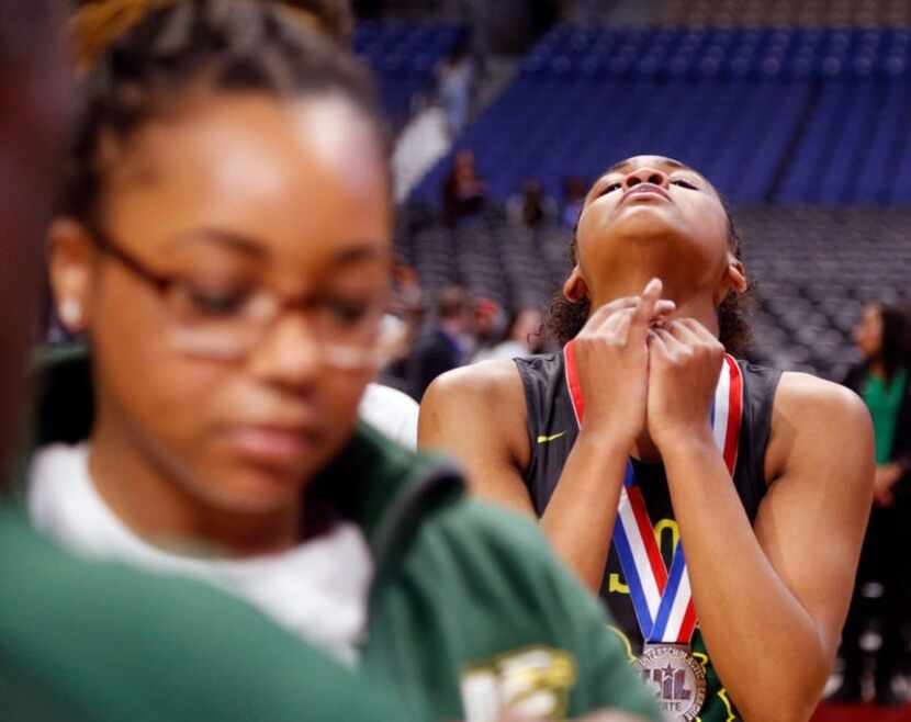 Desoto's Kendall Brown can't hide her disappointment after getting her medal. UIL girls...