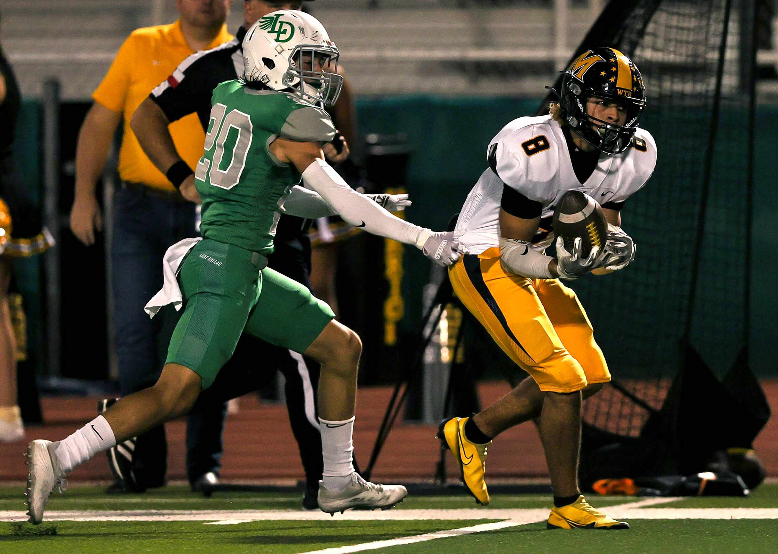 Frisco Memorial wide receiver Ferron Cotton (8) comes up with a touchdown reception against...