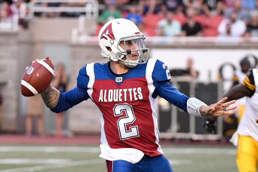 Montreal Alouettes quarterback Johnny Manziel looks for a receiver during the first half of...