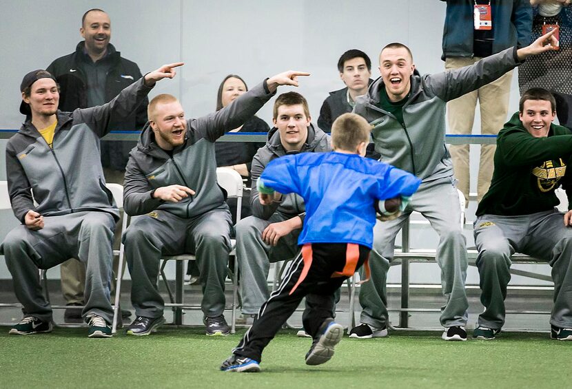 
North Dakota State players pointed Colin Ford toward the end zone during a Miracle League...