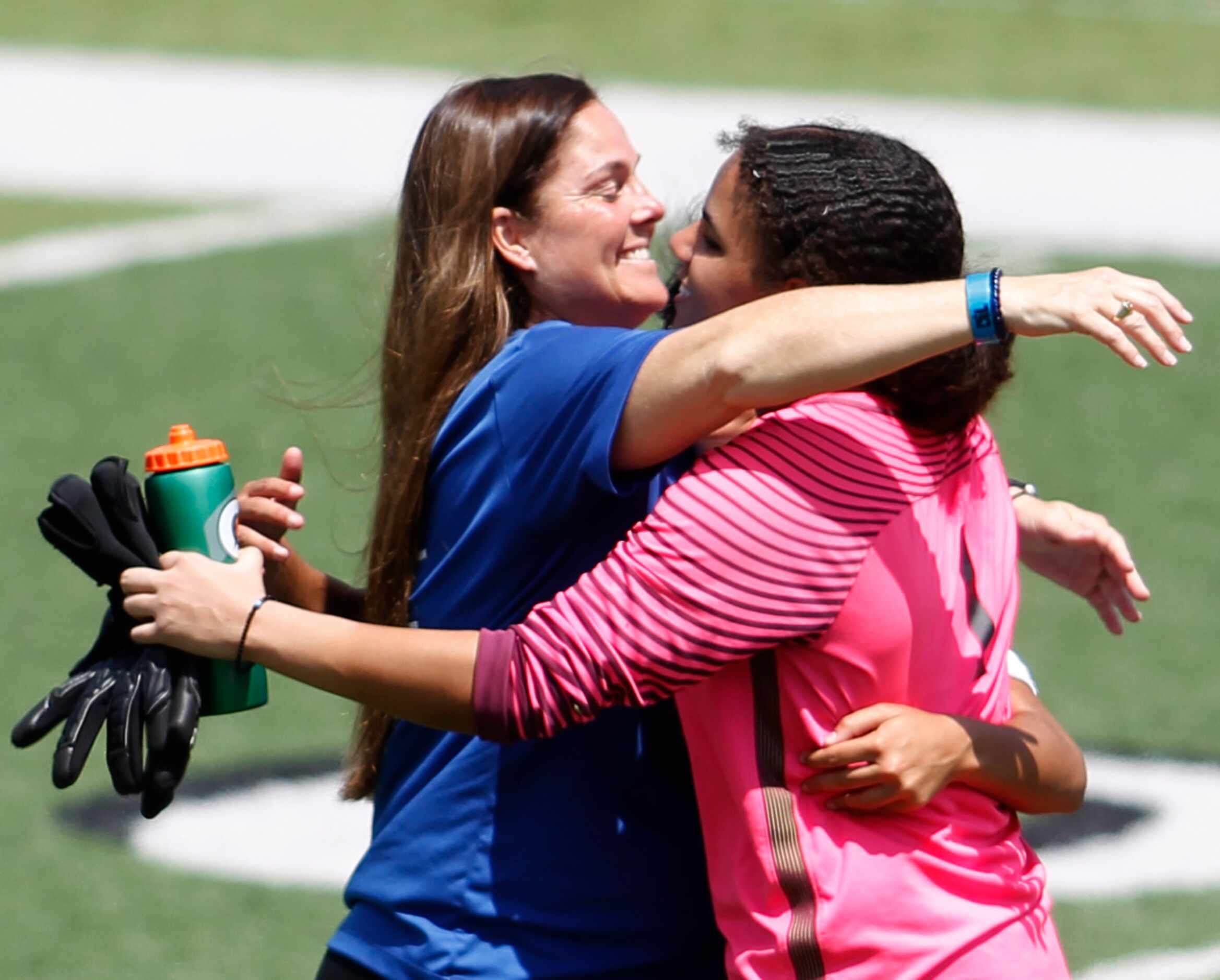 Frisco head coach Jaime Leraas, left, hugs goalkeeper Ariana Anderson following the team's...