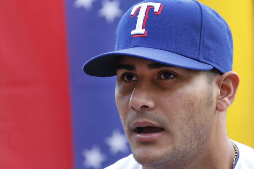 Texas pitcher Martin Perez is pictured at photo day during Texas Rangers baseball spring...