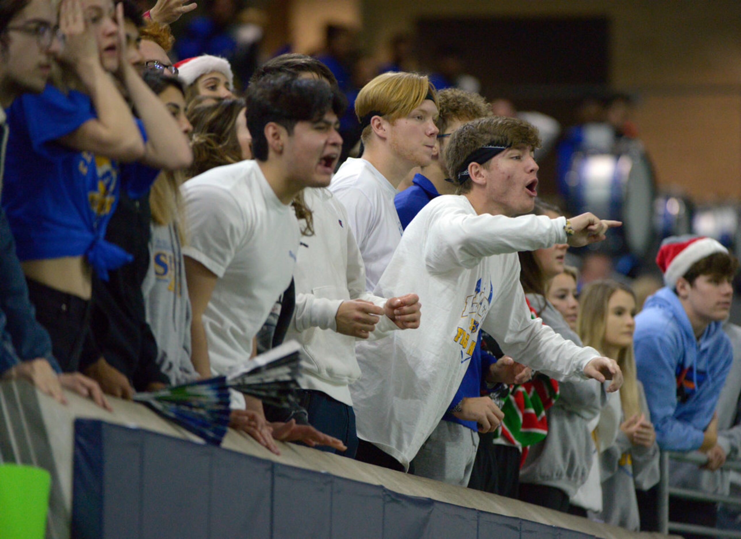 Frisco students cheer in the second half during a Class 5A Division II Region  II semifinal...
