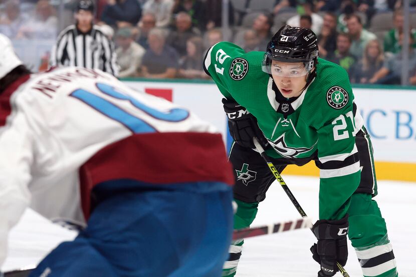 Dallas Stars left wing Jason Robertson (21) gets ready for a face off against the Colorado...