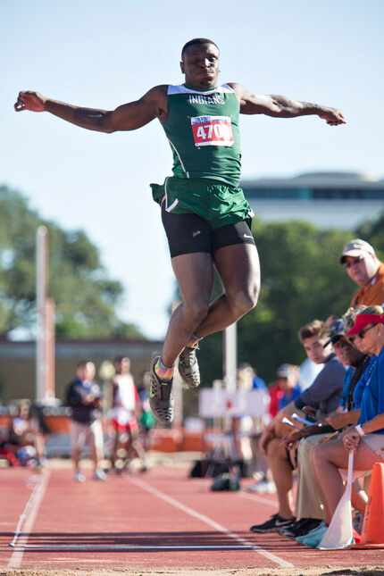 Waxahachie's Jalen Reagor (4709) takes a jump during the 5A Boys long jump during the UIL...