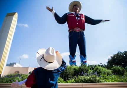 Isaiah Lee, 6, of Weatherford looks up at Big Tex on Friday, October 4, 2019 at Fair Park in...