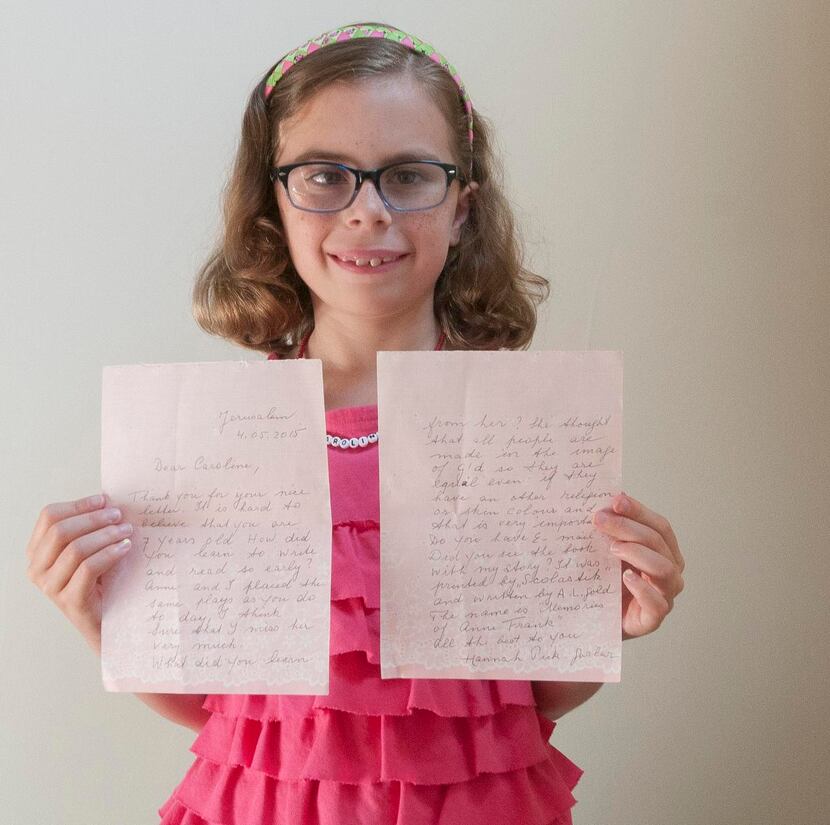 
Caroline Blankenship holds a handwritten letter she received from Holocaust survivor Hannah...