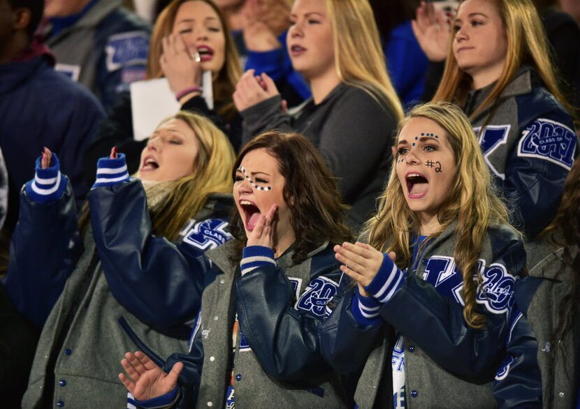 Face-painted Krum students cheer in the stands as the Bobcats take on Celina in a UIL Class...