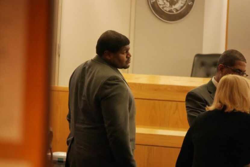 Josh Brent stands up in a Dallas court during a recess in his intoxication manslaughter...