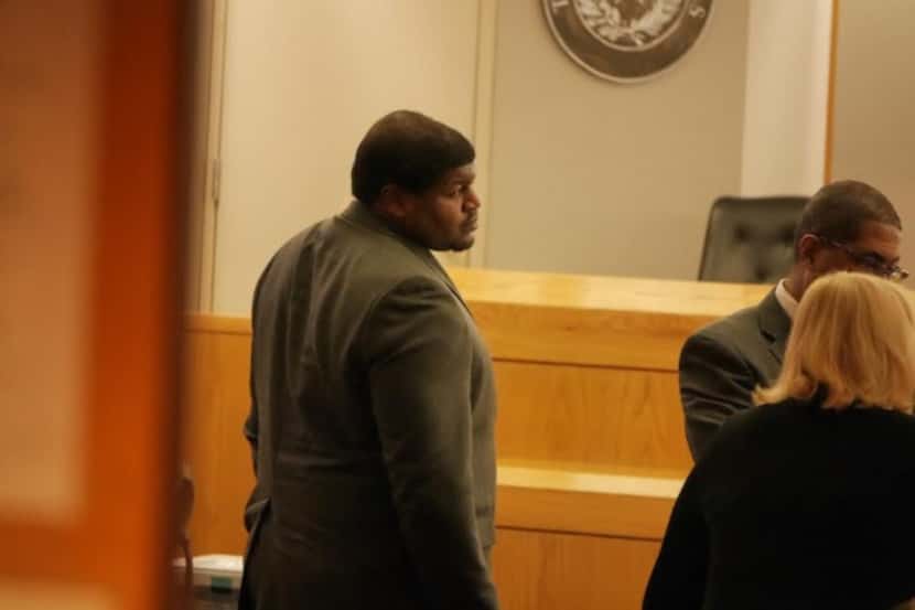 Josh Brent stands up in a Dallas court during a recess in his intoxication manslaughter...