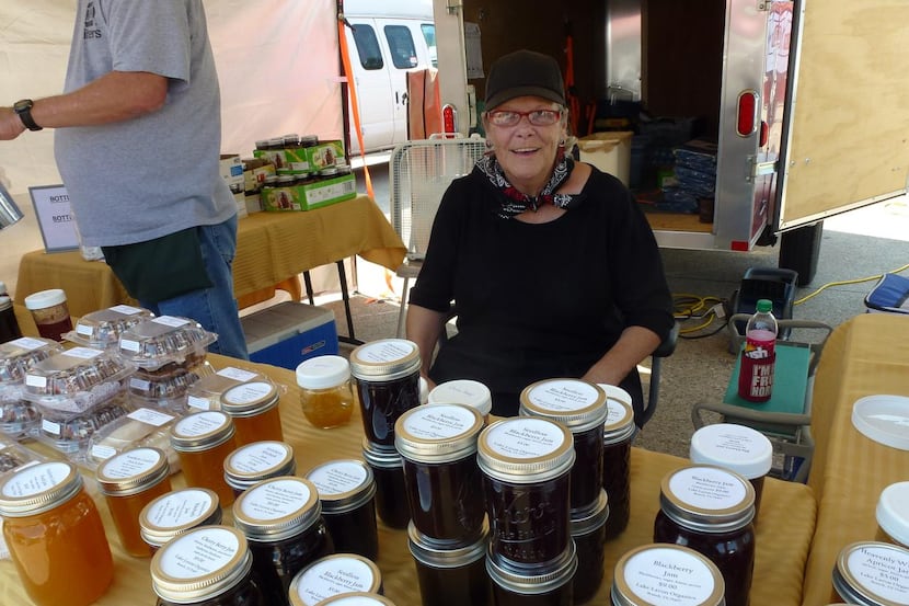 Alternate shot of Marilyn Fowler of Lake Lavon Organics selling jams and jellies on...