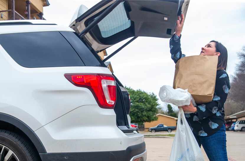 Brandy O’Keefe delivered groceries to her elderly mother, Vi Rentz, at her independent...