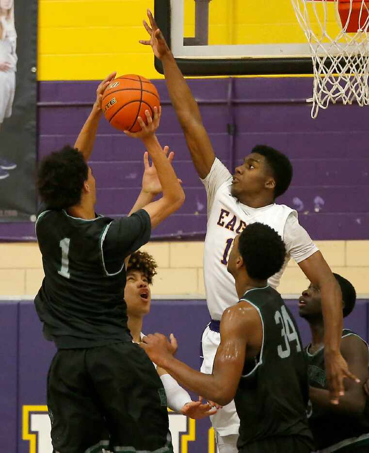 Berkner's Steven Samuels (1) has his shot blocked by Richardson's James Flowers (10) during...