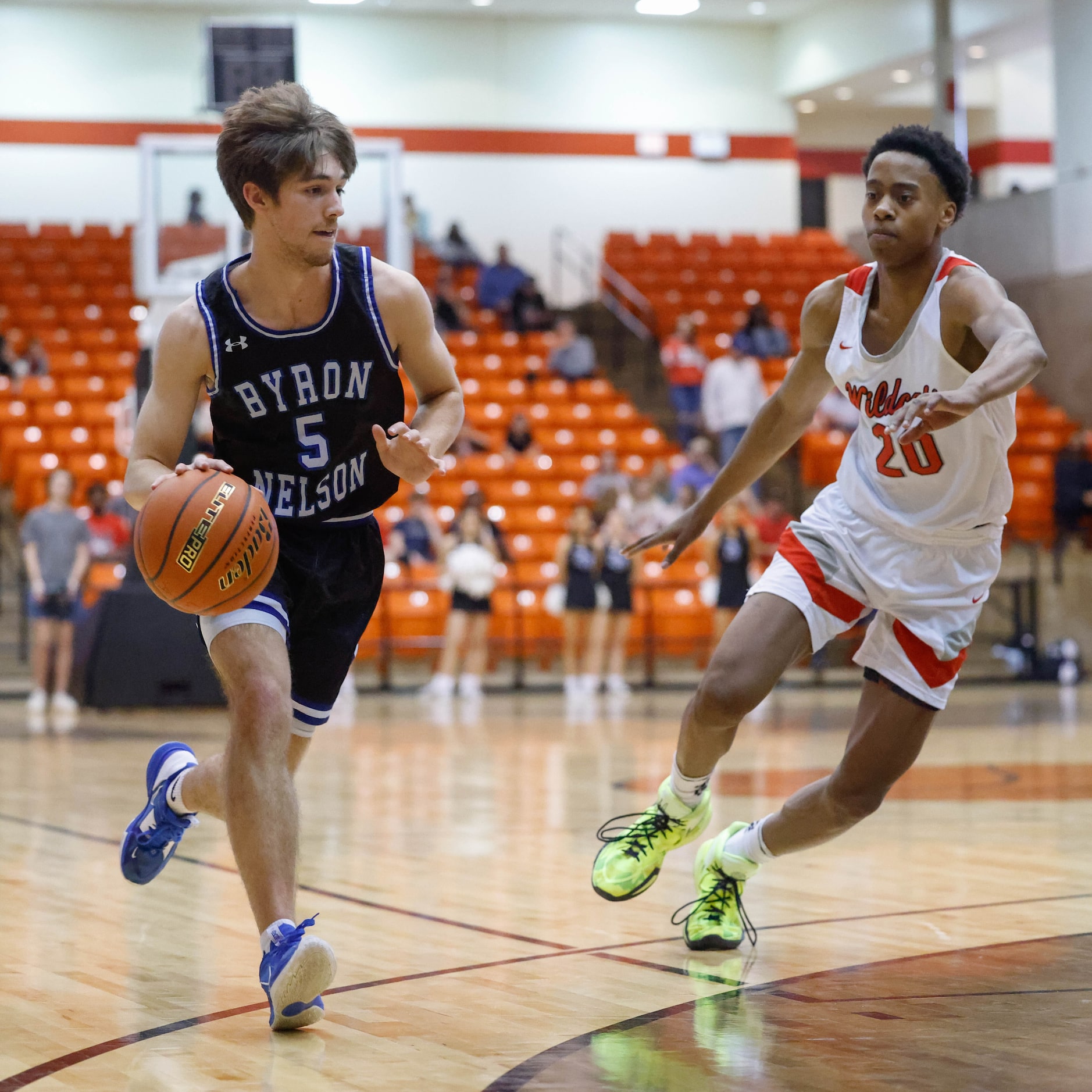 Byron Nelson High School' Jacob MacDonald (5) tries to pass Lake Highlands High School's Tre...