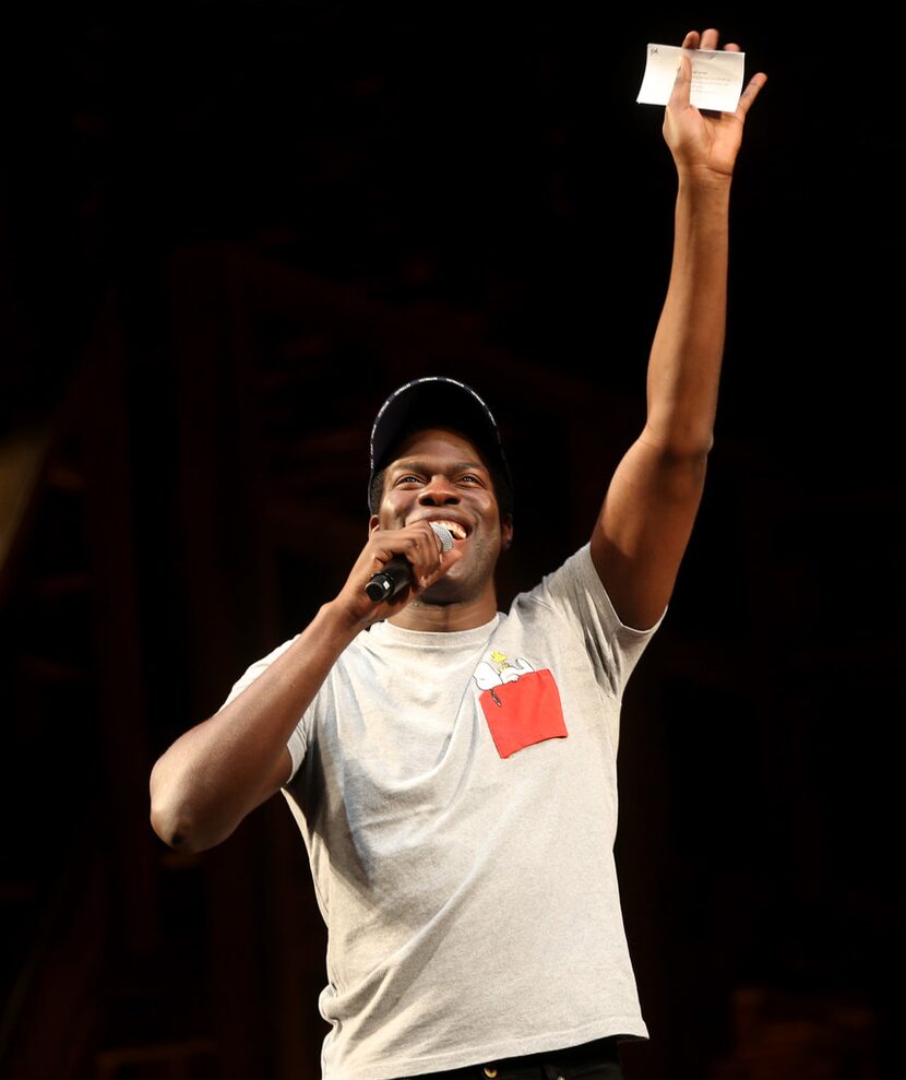 Hamilton cast member Kyle Scatliffe speaks to the audience during a Hamilton Education...